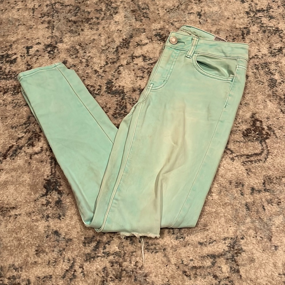 Green blue ripped jeans